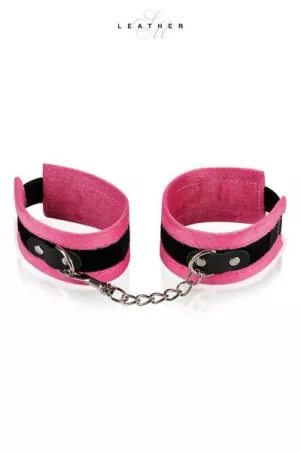 Rosa und schwarze Handgelenksmanschetten