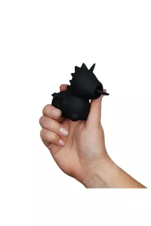 Vibromasseur licorne Wild Spirit Unihorn tenu dans la main pour illustrer sa taille compacte